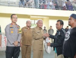 Bupati Asahan Serahkan Bantuan Beras 