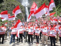 Jelang HUT RI Ke 79, Pemkab Asahan Laksanakan Pengibaran Bendera Merah Putih Di Wisata Alam Air Terjun Ponot