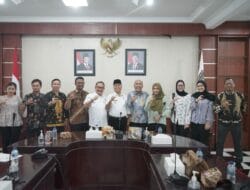 Pjs. Bupati Asahan melakukan Rapat dengan Komisi Informasi Sumut