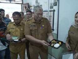 Sekda Kabupaten Asahan Launching Gerakan Serentak Uji Coba Makanan Gratis Bagi Peserta Didik di Kabupaten Asahan