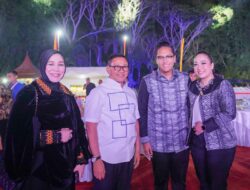 Kenakan Busana Batik Medan Buatan UMKM, Rico Waas & Ketua TP PKK Hadiri Gala Dinner Muskomwil I APEKSI