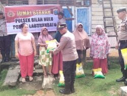Jumat Berkah, Polsek Bilah Hulu Bagikan Sembako Untuk Warga Kurang Mampu