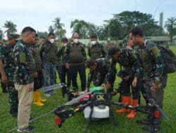 Bupati Asahan Uji Terbang Drone Pertanian di Lahan Pangan Padi Gogo Kodim 0208/AS